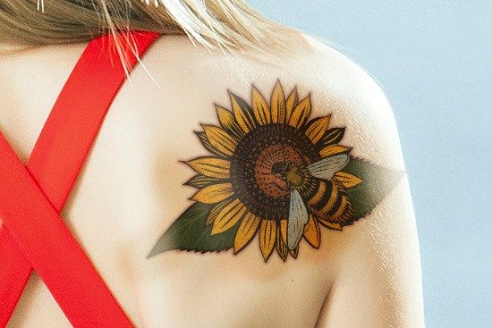 Cool sunflower tattoo on Shoulder Blade